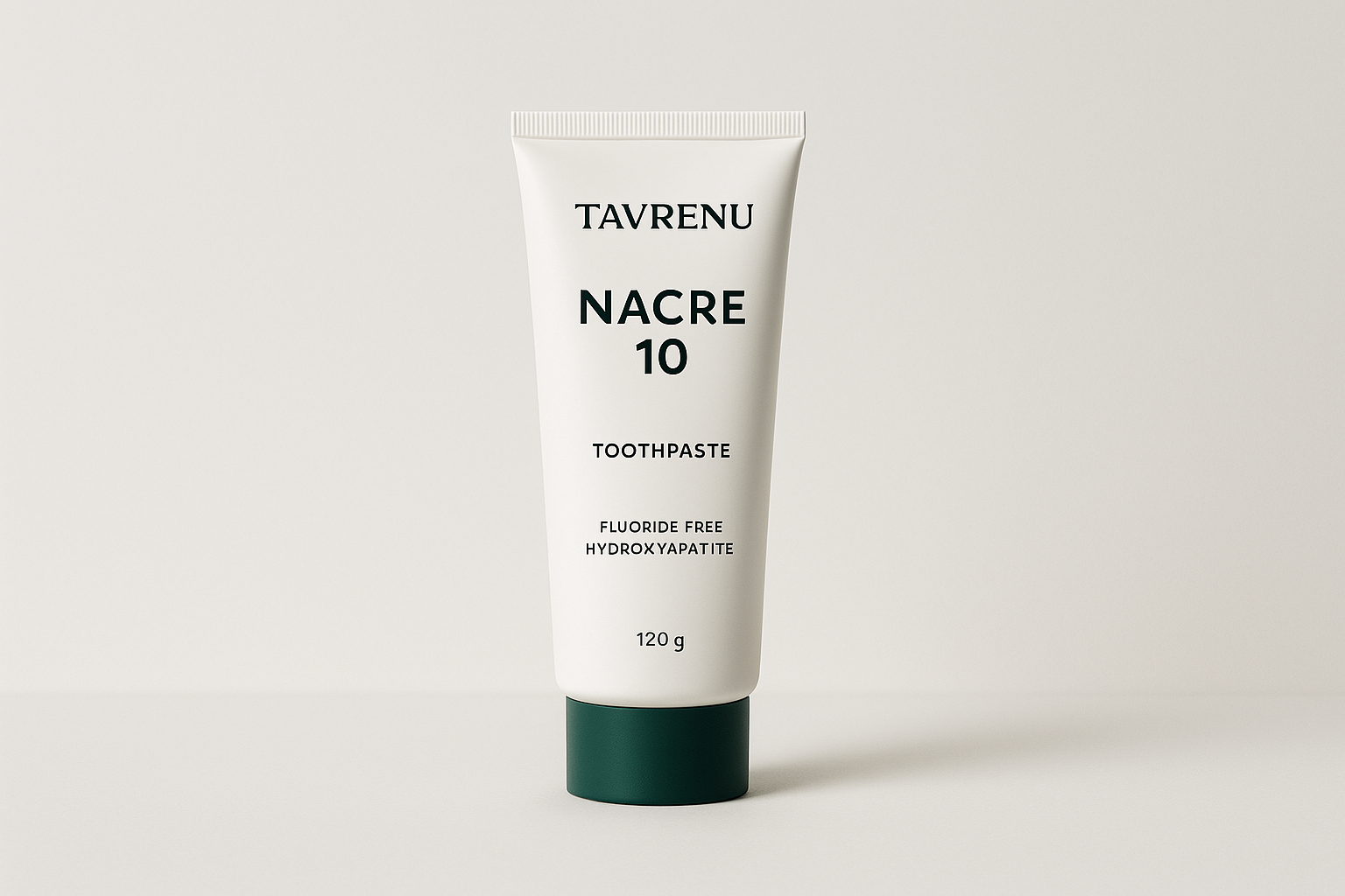 Nacre 10 hydroxyapatite toothpaste in a white aluminum tube with green cap