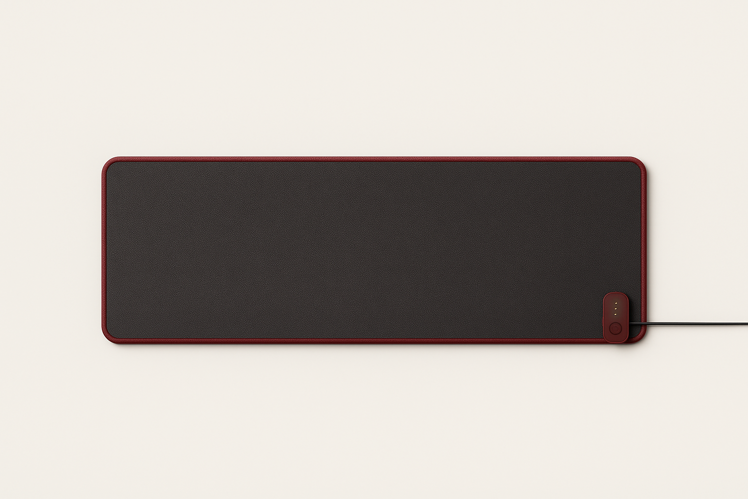 Hearthline 80 heated mouse pad beneath a full-size keyboard and mouse on a wood desk